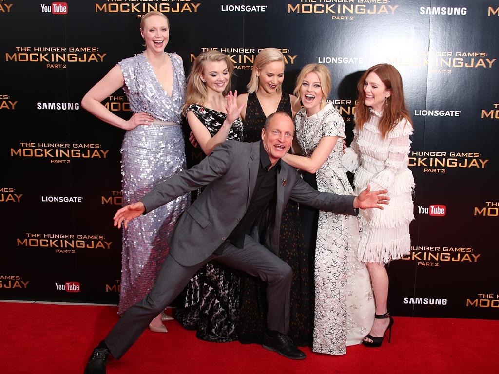 Gwendoline Christie, Natalie Dormer, Jennifer Lawrence, Elizabeth Banks, Julianne Moore and Woody Harrelson, pose for photographers at the “The Hunger Games: Mockingjay Part 2” UK Premiere at the Odeon Leicester Square on November 5, 2015 in London. Picture: AP