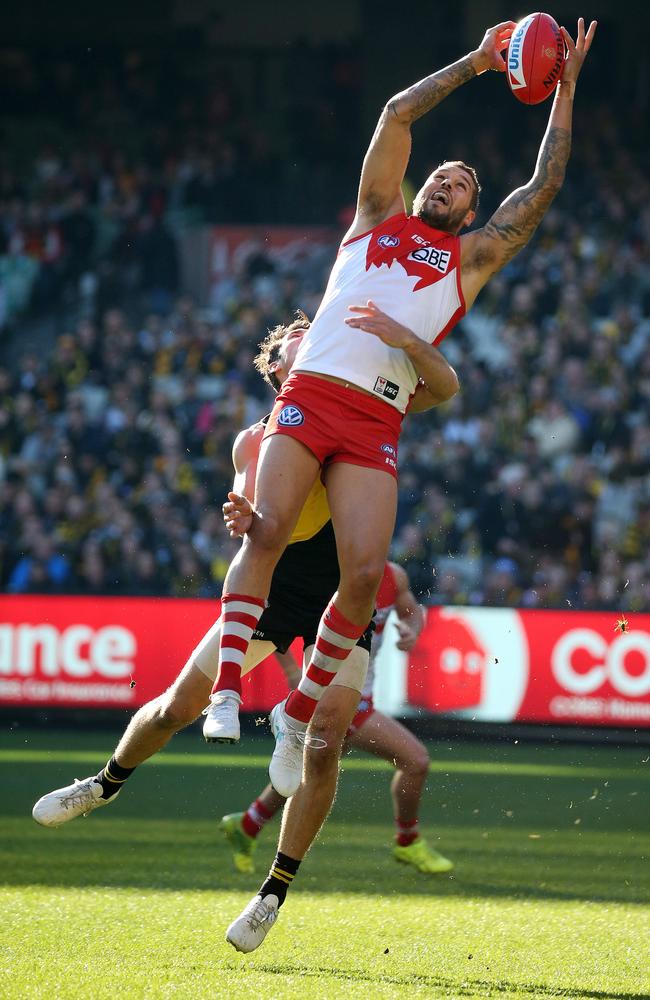 Lance Franklin soars to win this one-on-one battle. Picture: George Salpigtidis