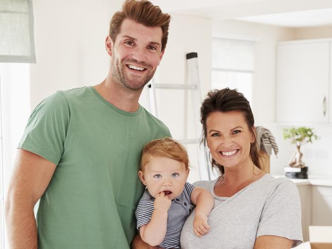 A young couple have just moved into the first home and have signed up to a new mortgage. Picture: iStock.