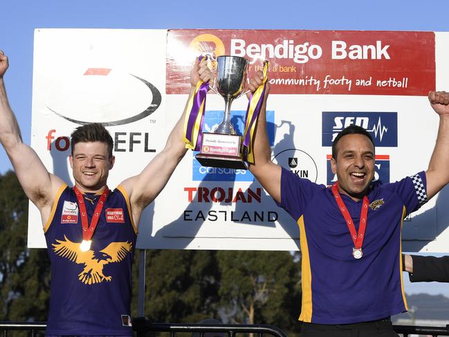 Vermont captain Lachlan Johns and coach Harmit Singh lift the premiership cup. Picture: Andy Brownbill