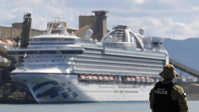 Military Police keep watch as the Ruby Princess docks at Port Kembla. Picture: Simon Bullard