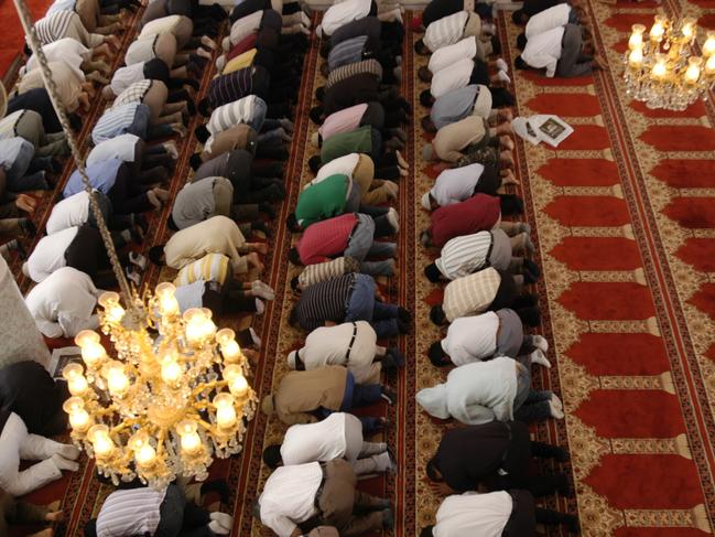 People praying at the Auburn Gallipoli Mosque.