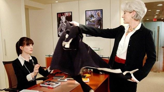 Meryl Streeep as fashion magazine editor Miranda Priestly, pictured dumping her coat on the desk of new assistant Andy Sachs (played by Anne Hathaway). Picture: Supplied