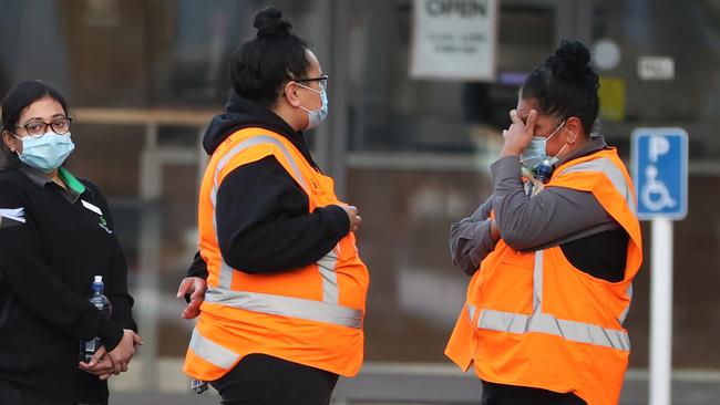 Staff outside the Countdown Lynn Mall . Picture: Getty