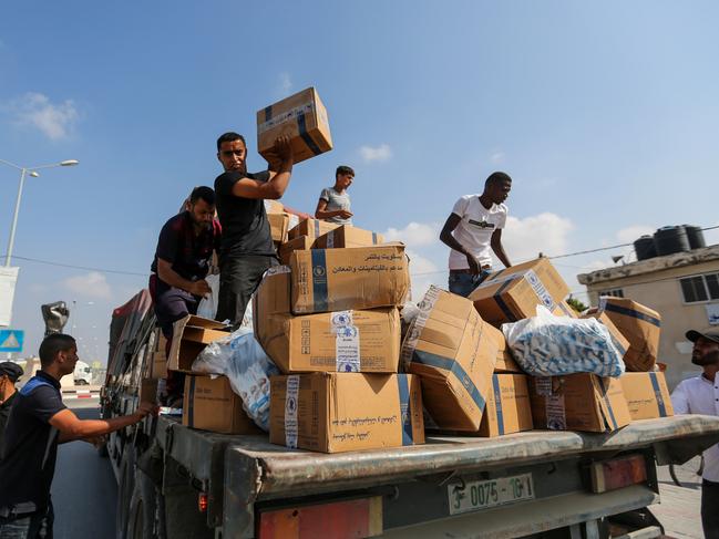 Trucks carrying aid enter through the Rafah crossing in Rafah, Gaza. Picture: Getty Images