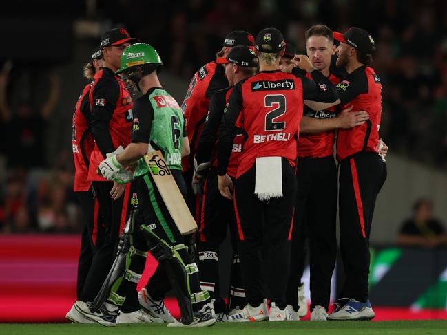 MELBOURNE, AUSTRALIA - JANUARY 12: Tom Rogers of the Renegades celebrates after taking the wicket of Sam Harper of the Stars during the BBL match between Melbourne Renegades and Melbourne Stars at Marvel Stadium, on January 12, 2025, in Melbourne, Australia. (Photo by Robert Cianflone/Getty Images)