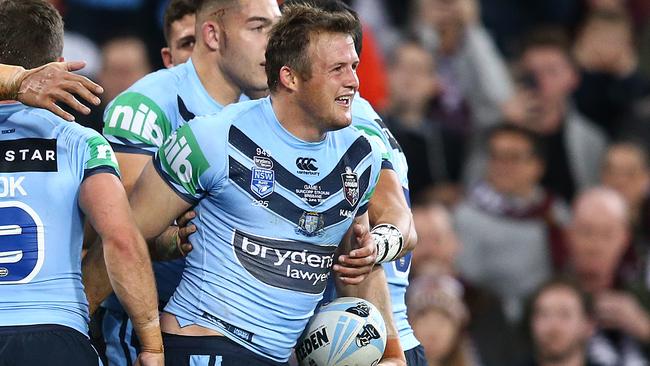 Josh Morris celebrates after scoring a try. Image: Jono Searle/Getty Images)