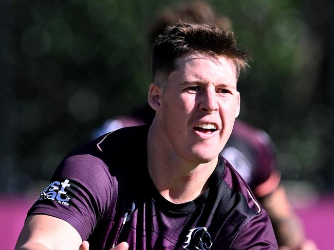 BRISBANE, AUSTRALIA - MAY 09: Josh Rogers passes the ball during a Brisbane Broncos NRL Captain's Run at Clive Berghofer Field on May 09, 2024 in Brisbane, Australia. (Photo by Bradley Kanaris/Getty Images)