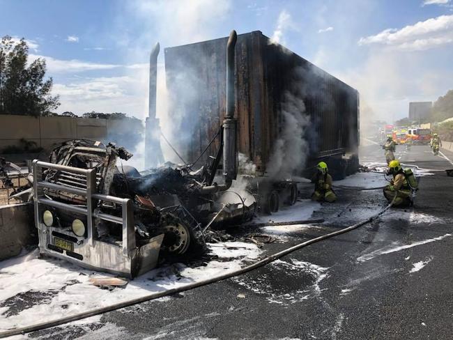 Smoke continues to billow from the truck. Picture: Fire and Rescue NSW