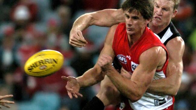 Saddington gets a handball away during his Sydney career. Picture: Craig Wilson