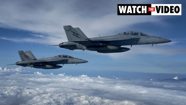 Upclose scenes of RAAF jets refuelling above NT