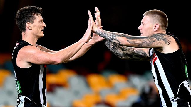 Brody Mihocek and Jordan De Goey celebrate a goal for Collingwood against Gold Coast. Picture: Bradley Kanaris/Getty Images