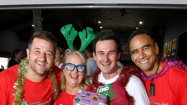 Cam Christie, Susie Longman, Sam O’Connor and Byron Christie at Labrador State School. Over 150 volunteers donate their time on Christmas Day.