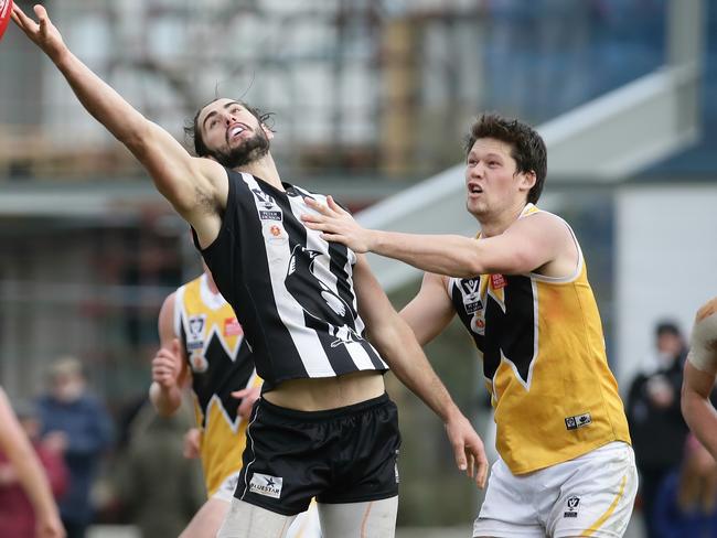 Brodie Grundy of Collingwood contests with Dylan Jones of Werribee during the VFL match between Collingwood and Werribee played at Victoria Park on Saturday, July 12, 2014 in Collingwood, Australia. Picture: Hamish Blair