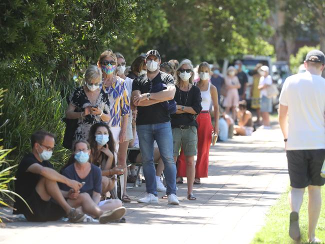 A long line of people waiting to get tested for COVID-19 at a pop up testing clinic in Avalon. Picture: Tim Hunter.