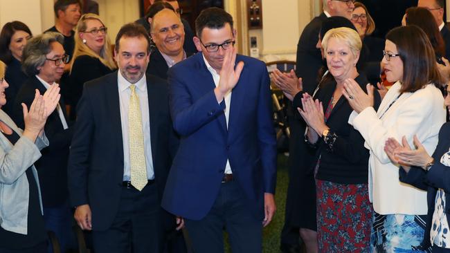 Members of the Victorian Labor Party applaud Premier Daniel Andrews as he arrives for their first caucus meeting following Saturday’s election win. Picture: AAP