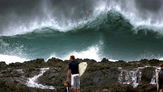 High Winds due to cyclone Beni bring huge surfing conditions to the Gold Coast. Huge wave hangs over Snapper Rocks. Picture: Adam Ward