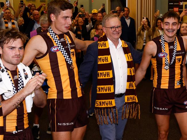 LAUNCESTON, AUSTRALIA - MAY 11: Australian Prime Minister Anthony Albanese sings the team song with Hawks players after the 2024 AFL Round 09 match between the Hawthorn Hawks and the St Kilda Saints at UTAS Stadium on May 11, 2024 in Launceston, Australia. (Photo by Michael Willson/AFL Photos via Getty Images)