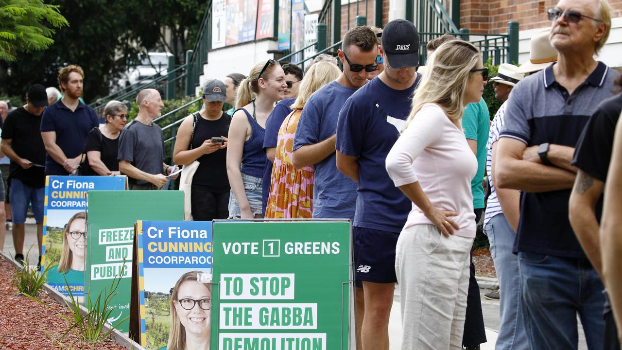 Voters and party members line up at the Coorparoo State School during the elections. Picture: NCA NewsWire/Tertius Pickard