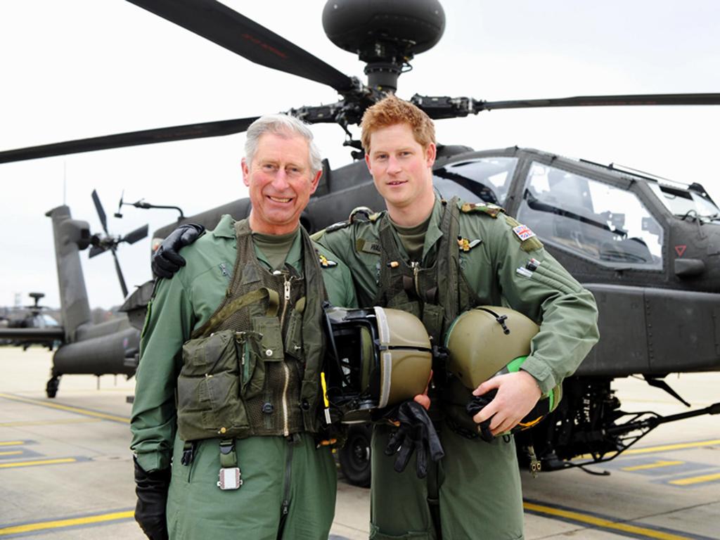 Father and son in 2011, when Prince Harry served in the Afghanistan War. Picture: Supplied