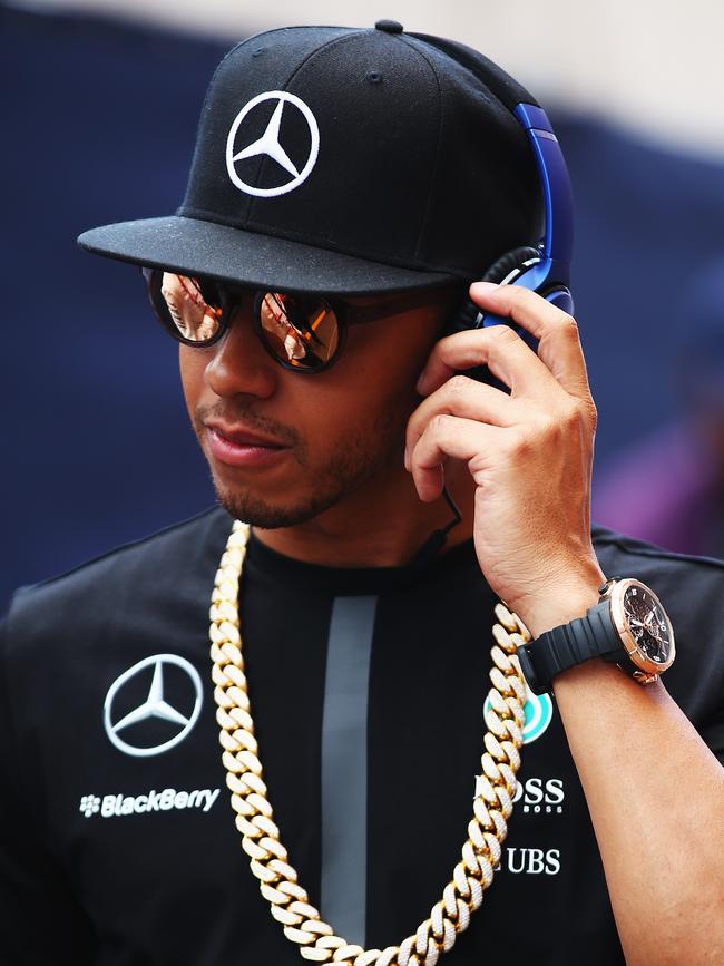 Here comes the bling. Heavy chains, big watches, giant headphones. Hamilton was always at the front of new fashion trends. This was before the drivers’ parade of the Monaco Grand Prix in 2015. Photo: Mark Thompson/Getty Images