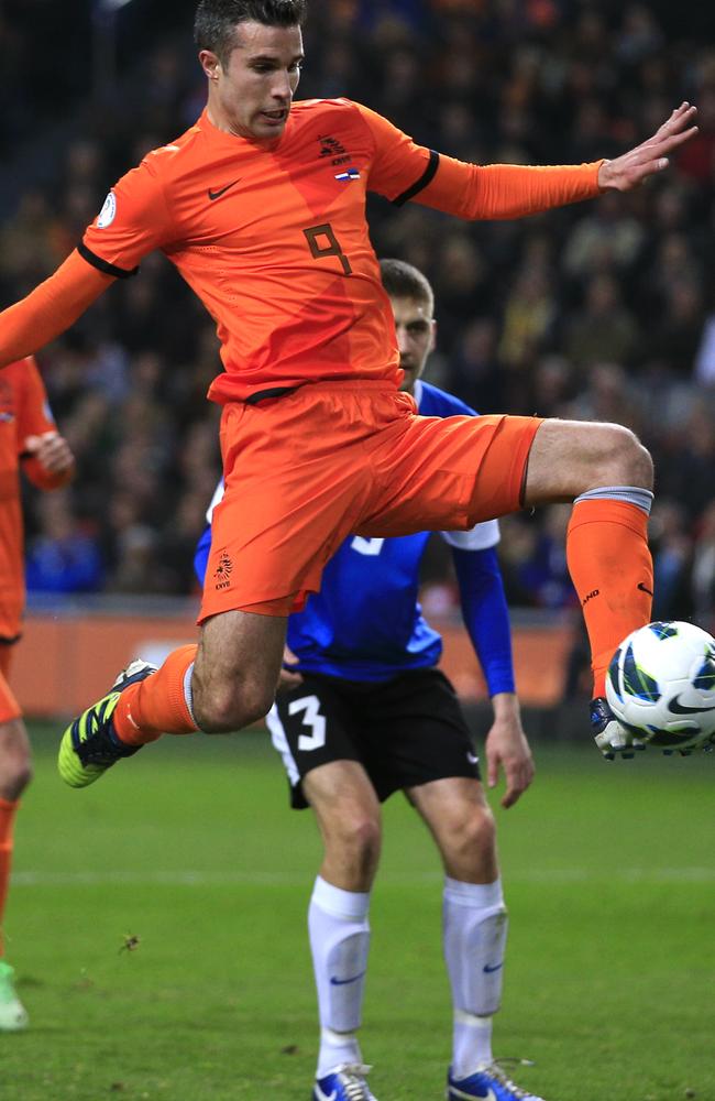 Van Persie controls before a brilliant goal.