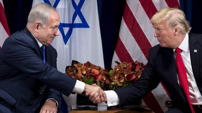 Israel’s Prime Minister Benjamin Netanyahu Mr Trump shake hands before a meeting at the Palace Hotel during the 72nd session of the United Nations General Assembly. Picture: Brendan Smialowski/AFP