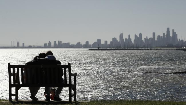 People enjoy the view of the CBD from Brighton Beach in Melbourne, Victoria. Picture: NCA NewsWire / Daniel Pockett