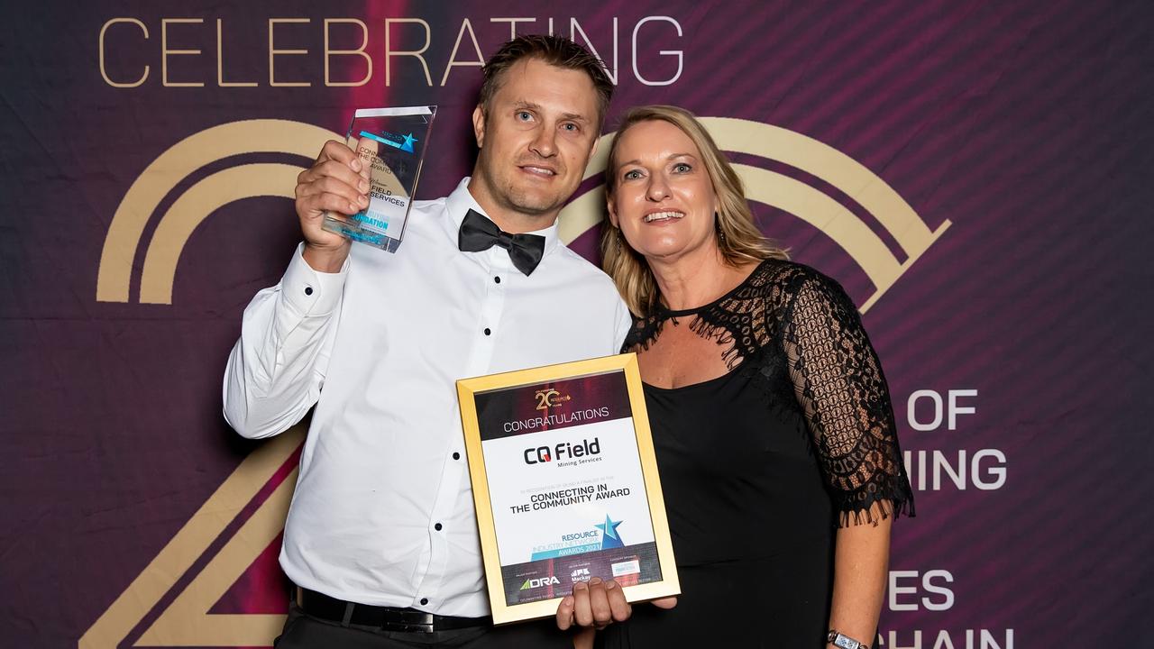 Jason Holt and Tracey Cuttriss Smith accepting the Connecting in the Community Award at the 2021 Resource Industry Network awards at the MECC: Picture: Tristan Mariano