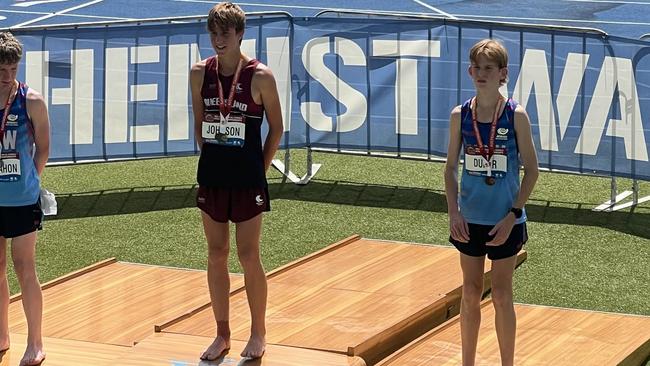 Cedar Johnson receives his gold medal at the All Schools Athletics Championships