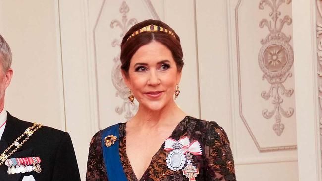 President of Finland Alexander Stubb (L) and his spouse Suzanne Innes-Stubb host a gala dinner for King Frederik X and Queen Mary (R) of Denmark at the Presidential Palace in Helsinki, Finland on March 4, 2025 during their 2-day state visit to Finland. (Photo by Ida Marie Odgaard / Ritzau Scanpix / AFP) / Denmark OUT