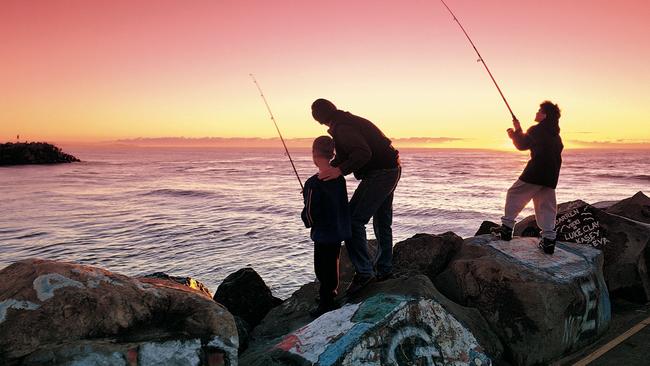 Fishing off the breakwall at Port Macquarie.