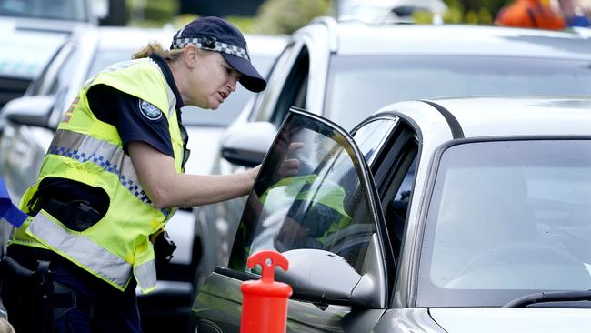 Police have stopped hundreds at the Queensland/NSW border. Picture: AAP Image/Dave Hunt