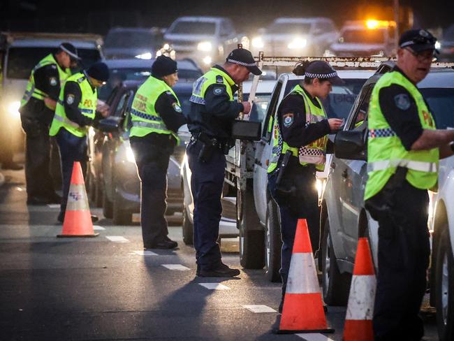 Police stop and question drivers at a checkpoint in 2020. Picture: David Gray