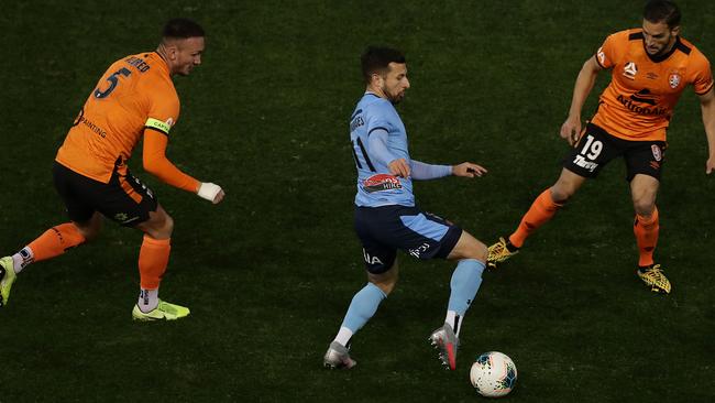 Sydney FC’s Kosta Barbarouses takes on the Brisbane Roar defence at McDonald Jones Stadium in Newcastle. Picture: Getty Images