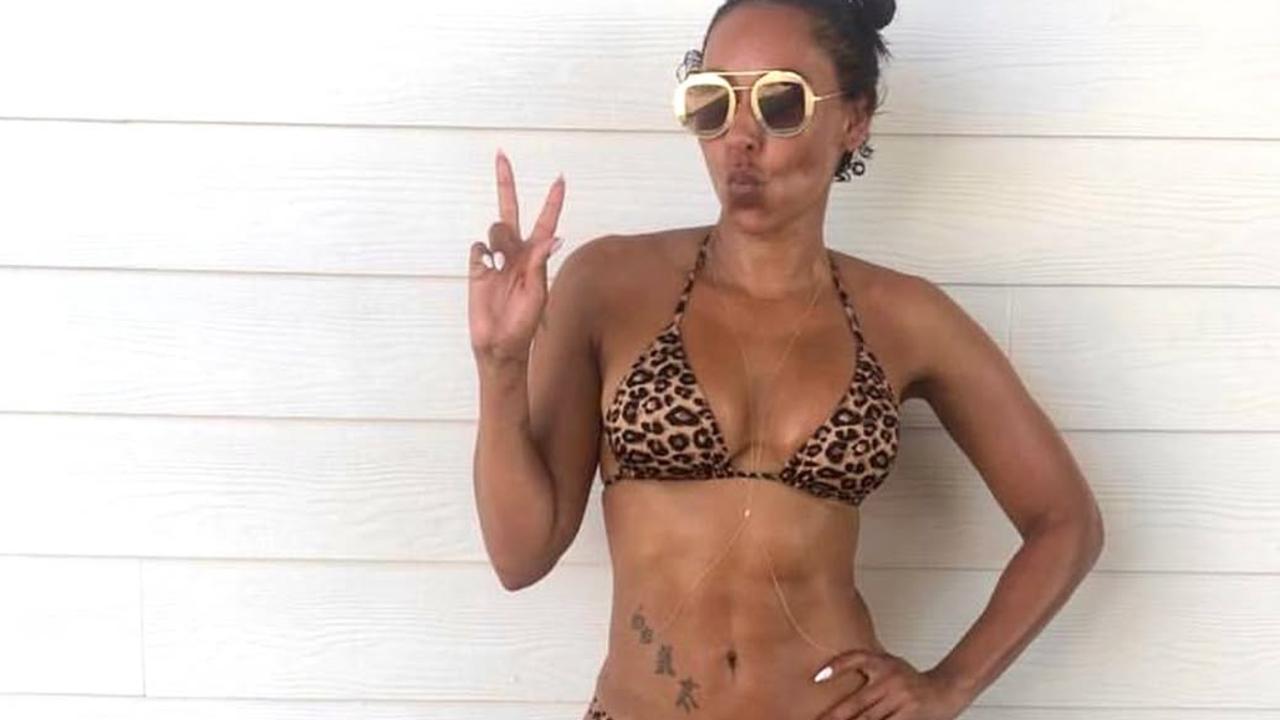 90s pop icon stuns in tiny bikini before 50th
