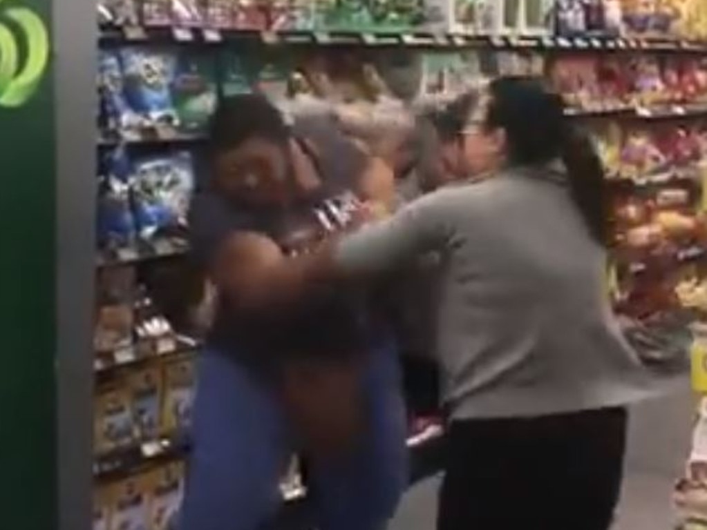 The Bebawys fight with another woman over toilet rolls in Woolworths Chullora.