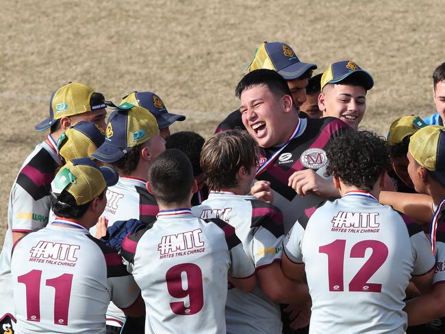 Grand final day of the Titans Schools League rugby league competition. Marsden Highs Teva Grey celebrate the win with team mates in the year 9-10 division... Picture Glenn Hampson