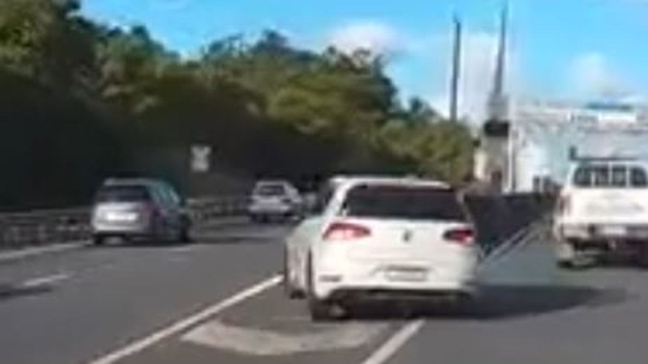 ‘Oh s***’: Car slams into barrier on busy SEQ highway