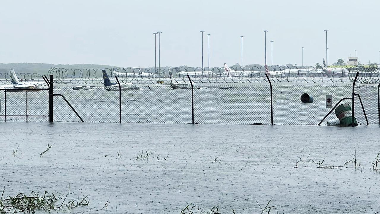 Images surfaced online shows planes submerged in floodwaters on the runway at Cairns Airport. Picture: Facebook/ Joseph Dietz