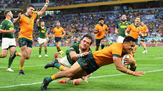 Wallabies player Len Ikitau scores a try against South Africa in a 2021 game. Picture: Getty