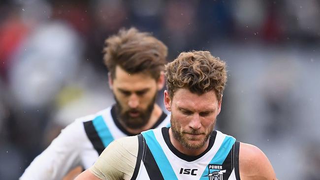 Brad Ebert and Justin Westhoff after Port’s loss to Collingwood on Saturday. Picture: Quinn Rooney/Getty Images