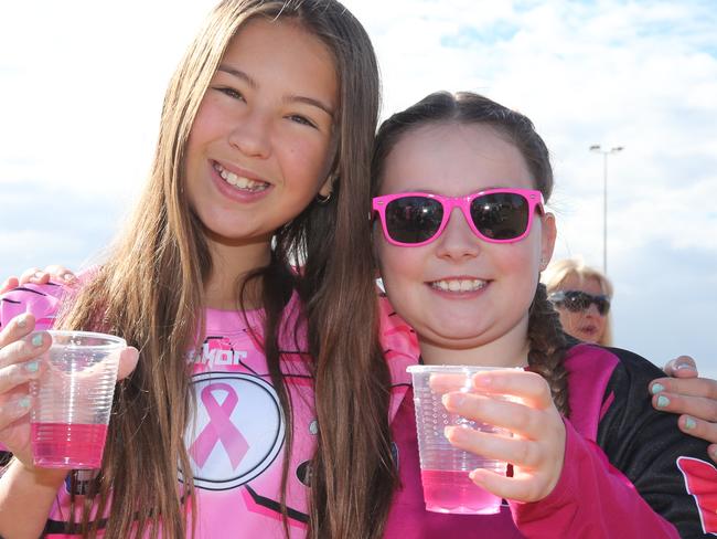 It’s all pink for Maddie Cauchie and Brinley Lewis.