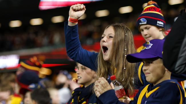 Crows fans celebrate the win during the AFL Gather Round match between the Adelaide Crows and Carlton Blues at the Adelaide Oval on April 13, 2023. Photo by Phil Hillyard(Image Supplied for Editorial Use only - **NO ON SALES** - Â©Phil Hillyard )