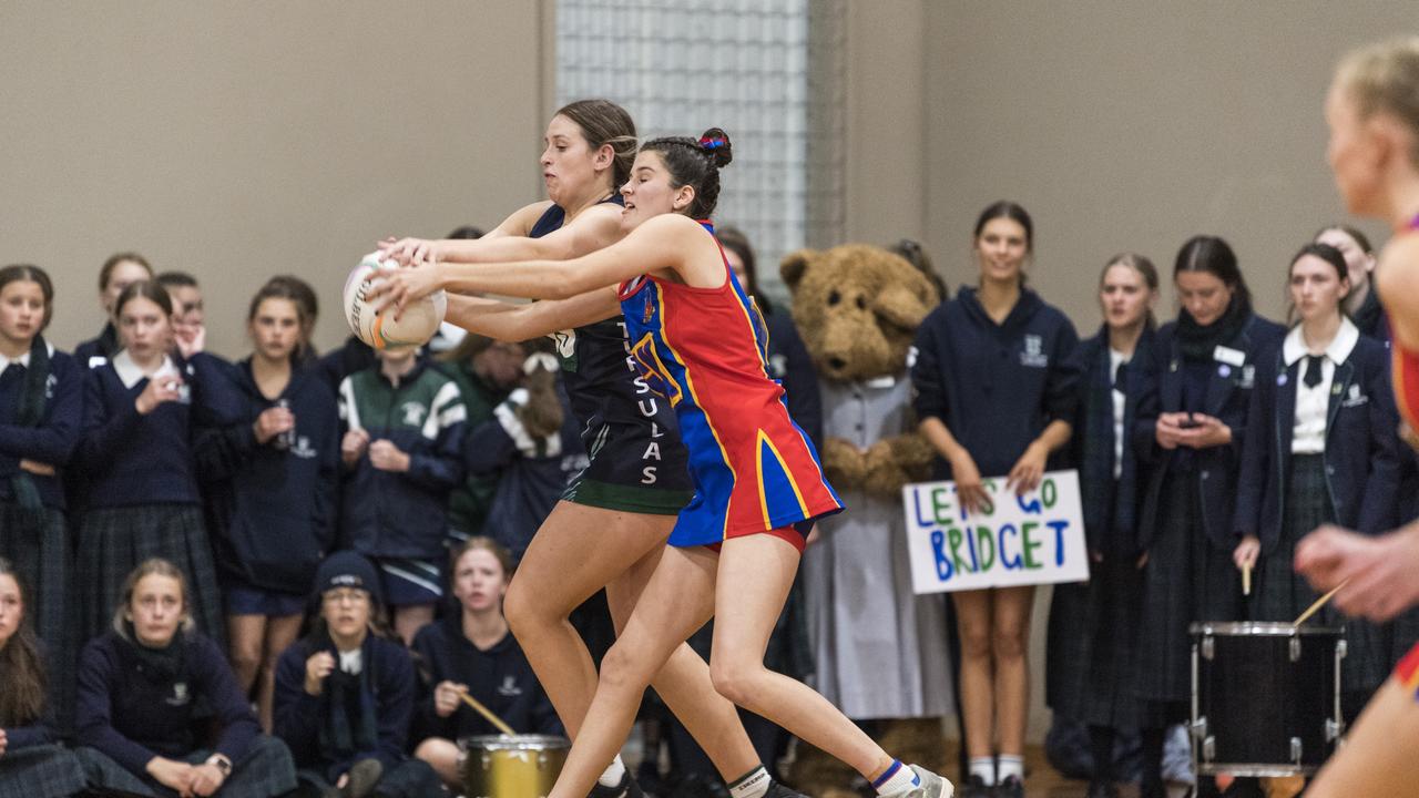 St Ursula's College player Alice Marshall (left) and Grace Taylor of Downlands College compete for possession. Picture: Kevin Farmer