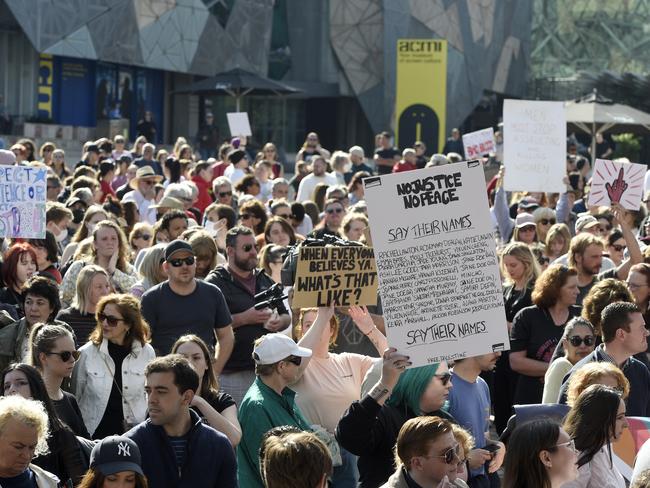 Thousands gather at Federation Square for the national rally against gender based violence. Picture: Andrew Henshaw