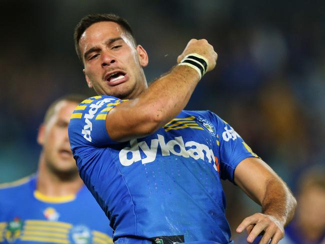 Corey Norman celebrates after scoring a try against the Bulldogs. Pic Brett Costello