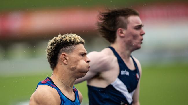 Men's U20 200m Final NSW athlete Connor Bond from Pymble takes silver behind Calab Law from Queensland. Picture: Julian Andrews