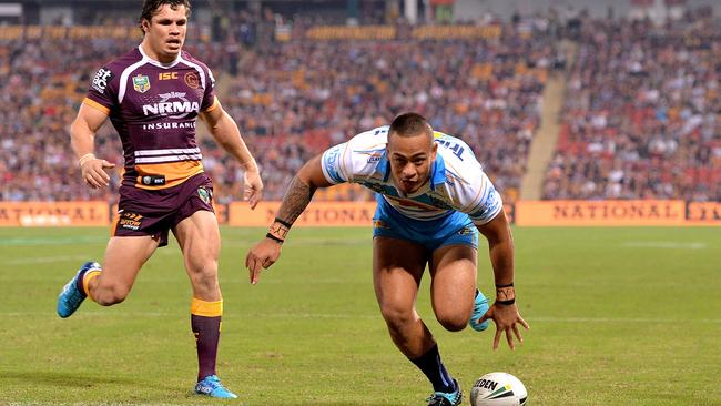 Phillip Sami scores a try in the Titans’ win against the Brisbane Broncos earlier this year. Photo: Getty Images