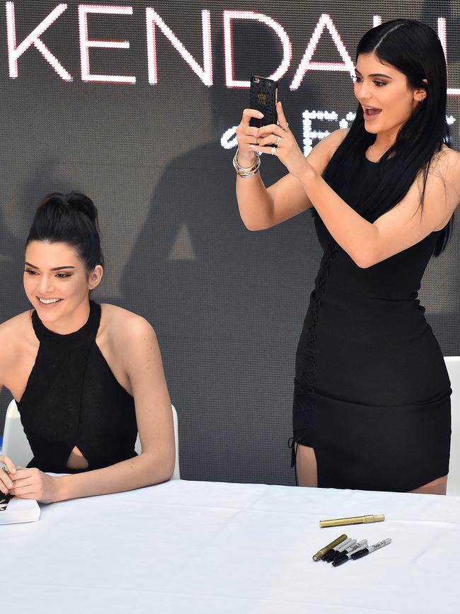 A huge crowd rushed to Chadstone to see Kendall and Kylie Jenner promote the launch of the Kendall + Kylie collection at Forever New in 2015. Picture: Julian Smith